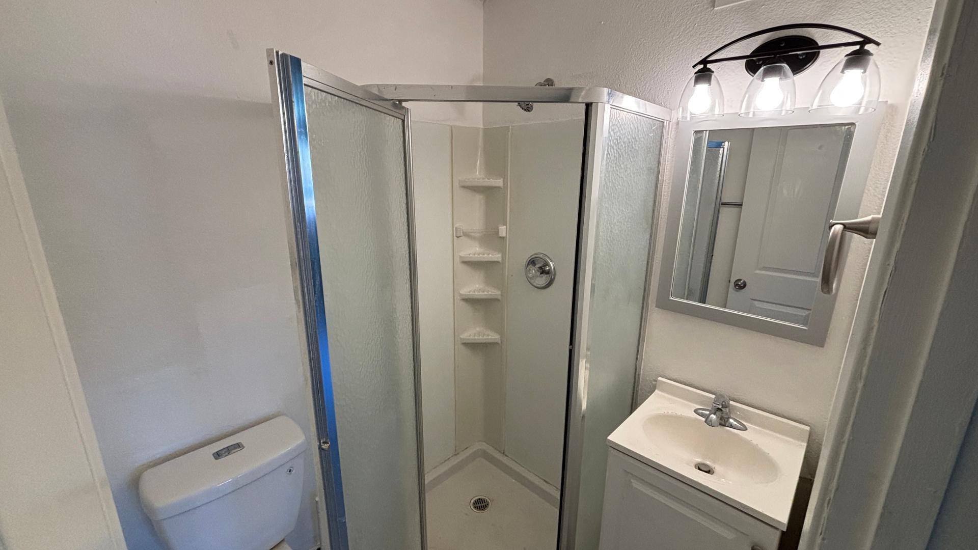 1130 East Butler Drive, Unit B4 Phoenix, AZ 85020 - Photo 11 of 17 a bathroom with a shower and a sink