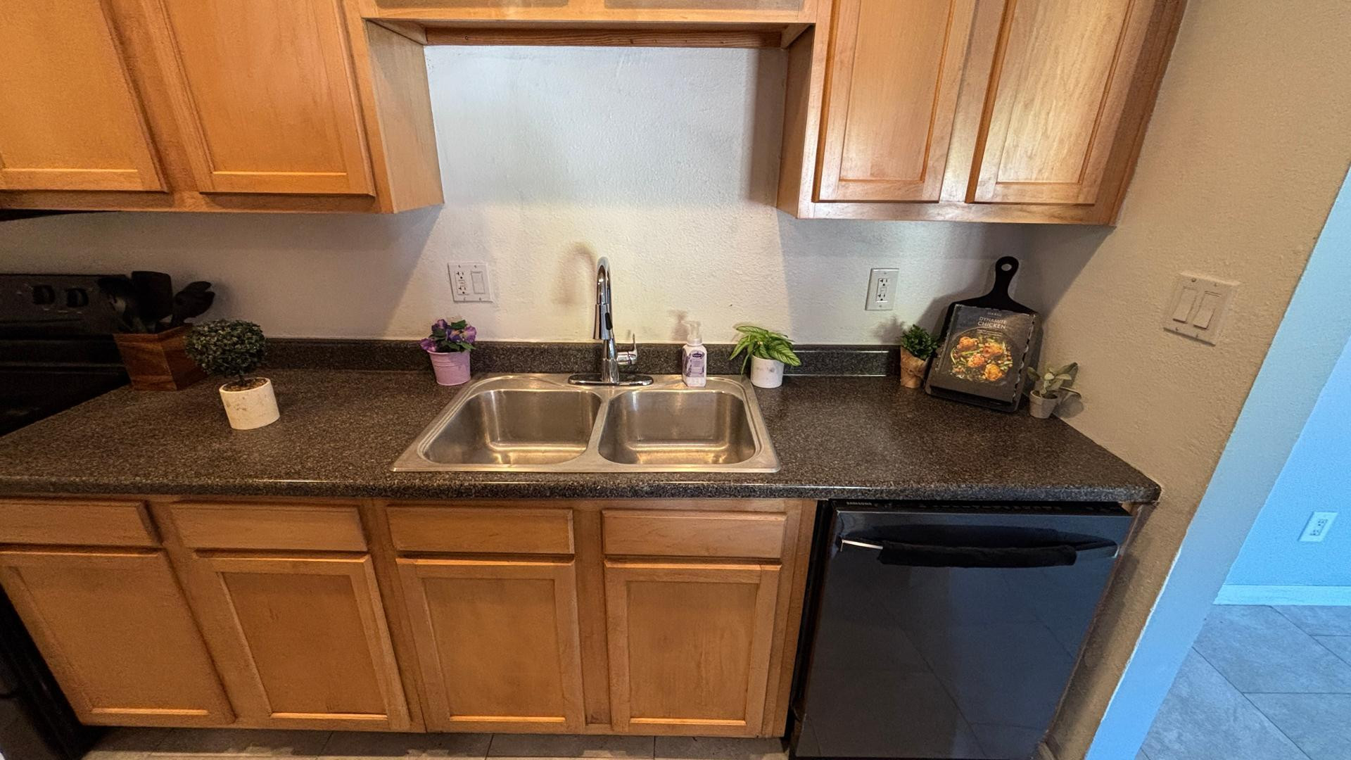 1130 East Butler Drive, Unit B4 Phoenix, AZ 85020 - Photo 6 of 17 a kitchen with sink cabinets and a window