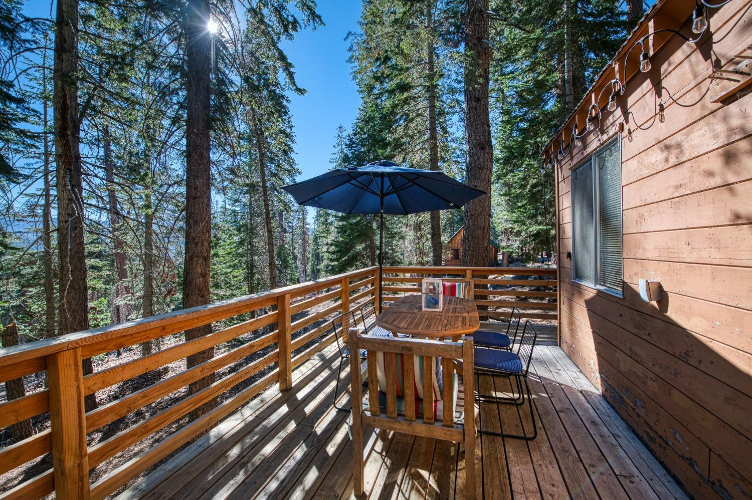 61347 Old Hunting Road Mono Hot Springs, CA 93634 - Photo 25 of 31 a view of chairs and table in the balcony