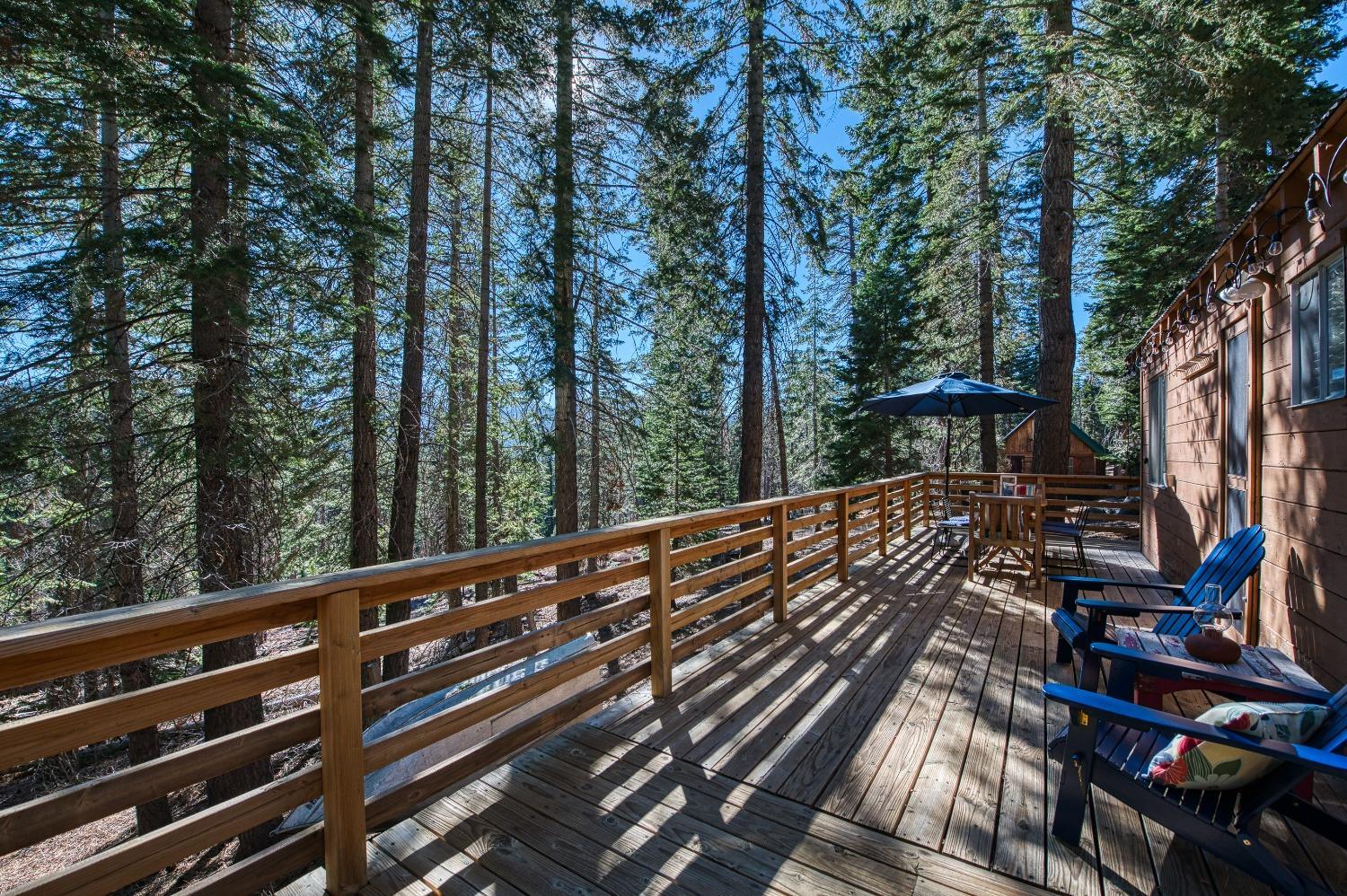 61347 Old Hunting Road Mono Hot Springs, CA 93634 - Photo 27 of 31 a view of balcony with wooden floor and outdoor space