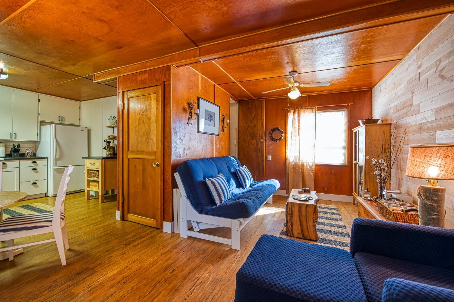 61347 Old Hunting Road Mono Hot Springs, CA 93634 - Photo 5 of 31 a view of a livingroom with furniture and a couch