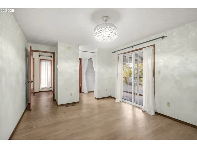 a bathroom with a sink a toilet a mirror and shower