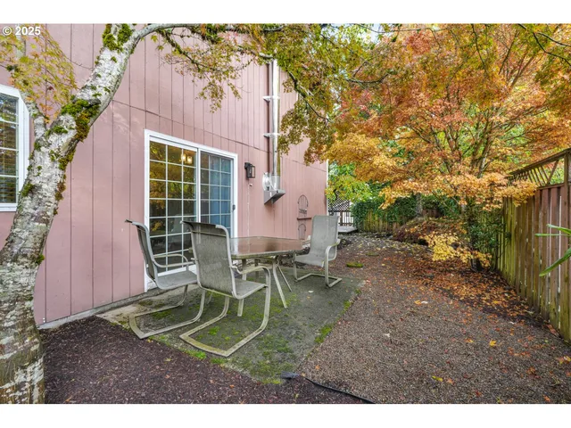 a garden view with a seating space