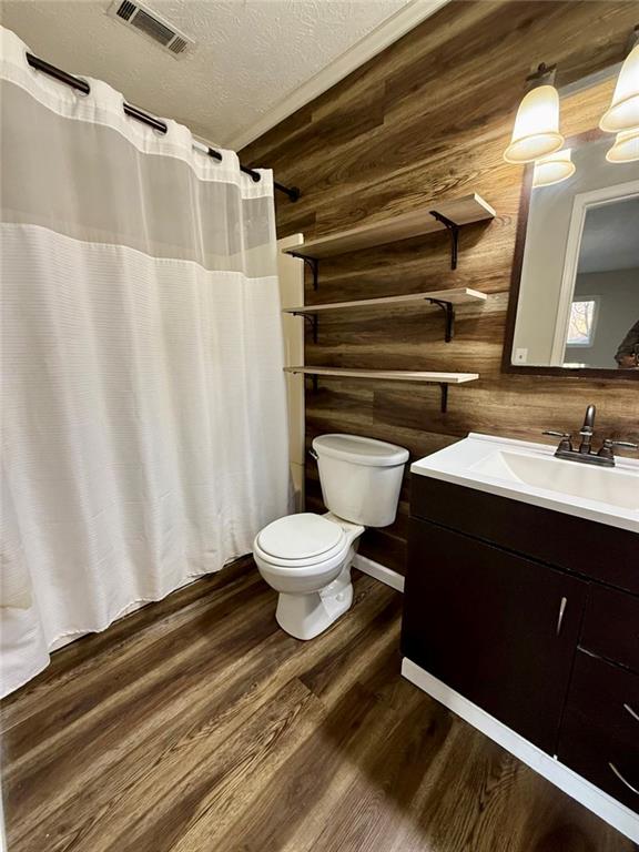 1801 Dews Pond Road Southeast Calhoun, GA 30701 - Photo 10 of 16 a bathroom with a sink and a toilet