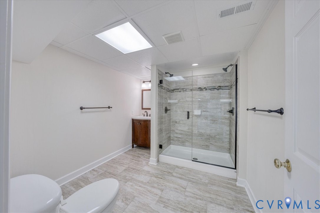 1813 Gildenborough Court Midlothian, VA 23113 - Photo 39 of 46 a bathroom with a shower and a toilet