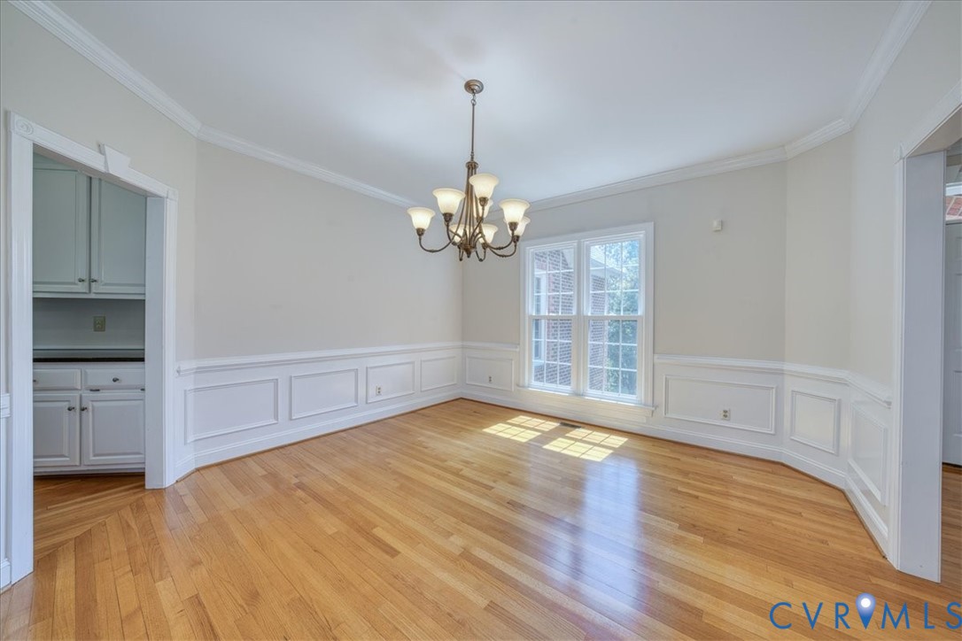 1813 Gildenborough Court Midlothian, VA 23113 - Photo 6 of 46 a view of a room with wooden floors closet and windows