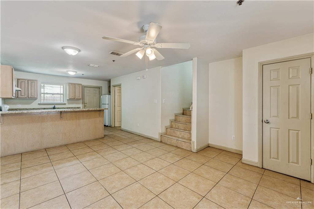 1500 Humming Bird Court, Unit 15 Pharr, TX 78577 - Photo 4 of 26 a view of a kitchen with cabinet and a window