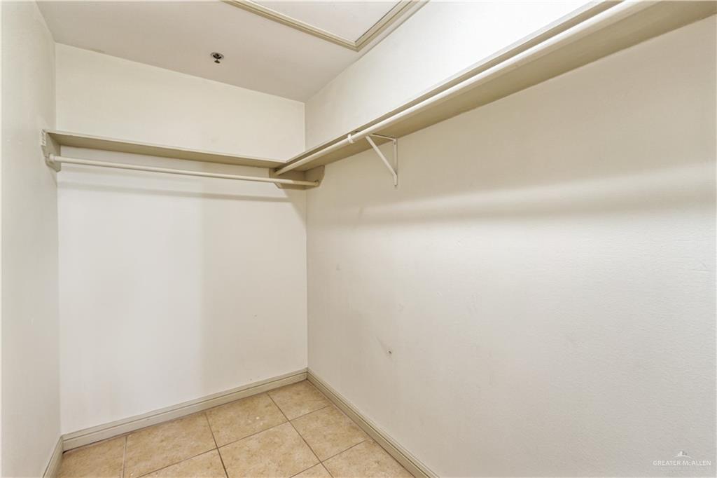1500 Humming Bird Court, Unit 15 Pharr, TX 78577 - Photo 10 of 26 a view of a room with racks on the wall