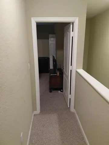 a view of room with furniture and cabinet