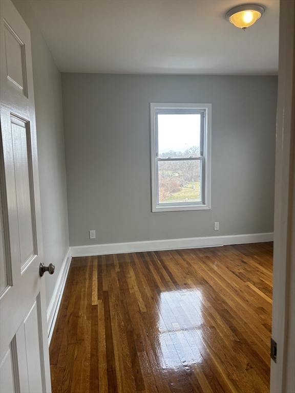 63 Callender Street, Unit 3R Boston, MA 02124 - Photo 12 of 24 a view of wooden floor and window in a room