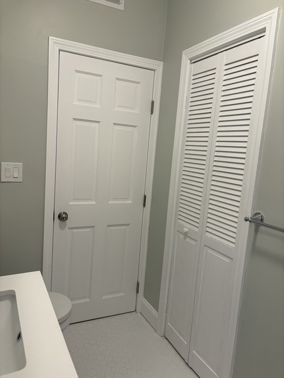 63 Callender Street, Unit 3R Boston, MA 02124 - Photo 20 of 24 a bathroom with a sink and a window
