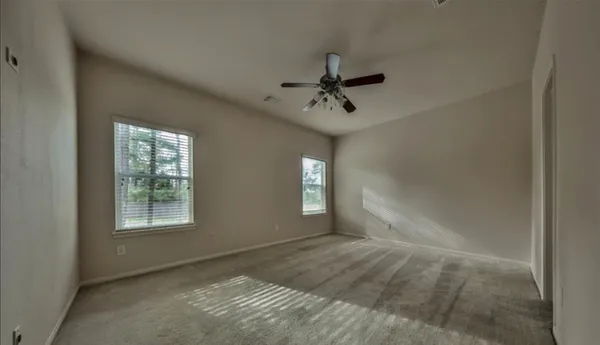 a view of an empty room and window