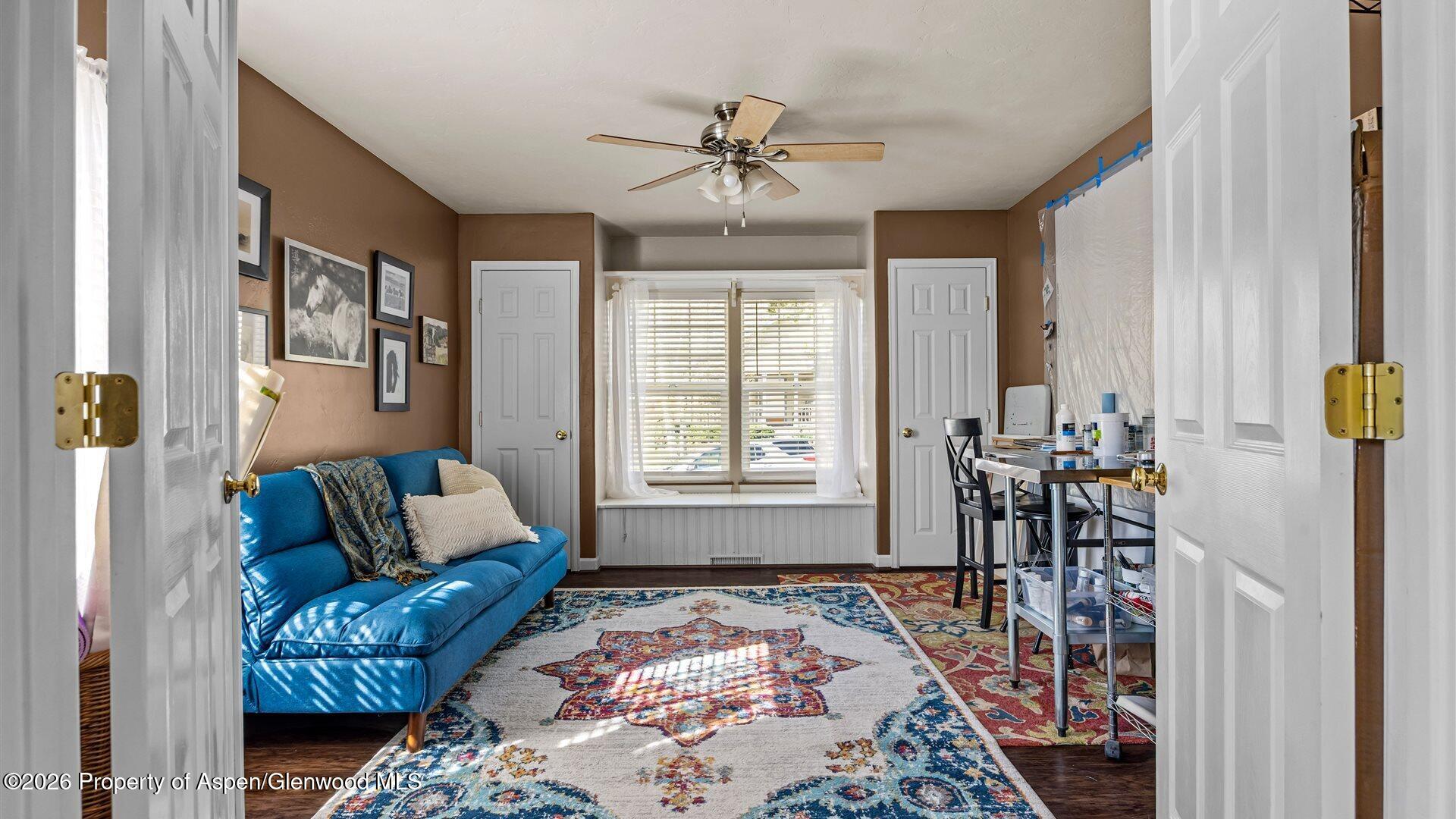 606 Lariat Loop New Castle, CO 81647 - Photo 11 of 27 a living room with furniture and a rug