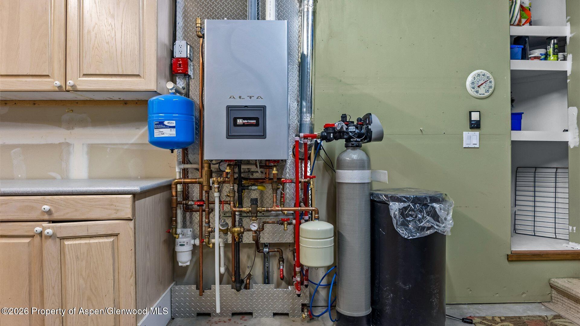 606 Lariat Loop New Castle, CO 81647 - Photo 20 of 27 a view of storage and utility room with washer and dryer