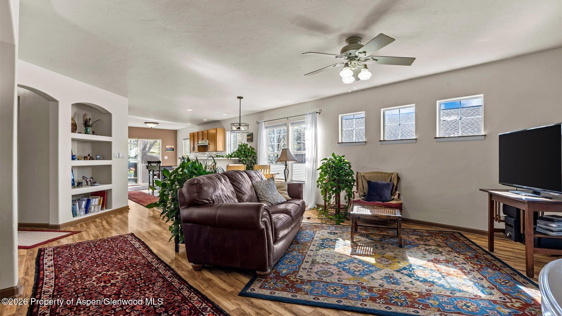 606 Lariat Loop New Castle, CO 81647 - Photo 2 of 27 a living room with furniture and a flat screen tv