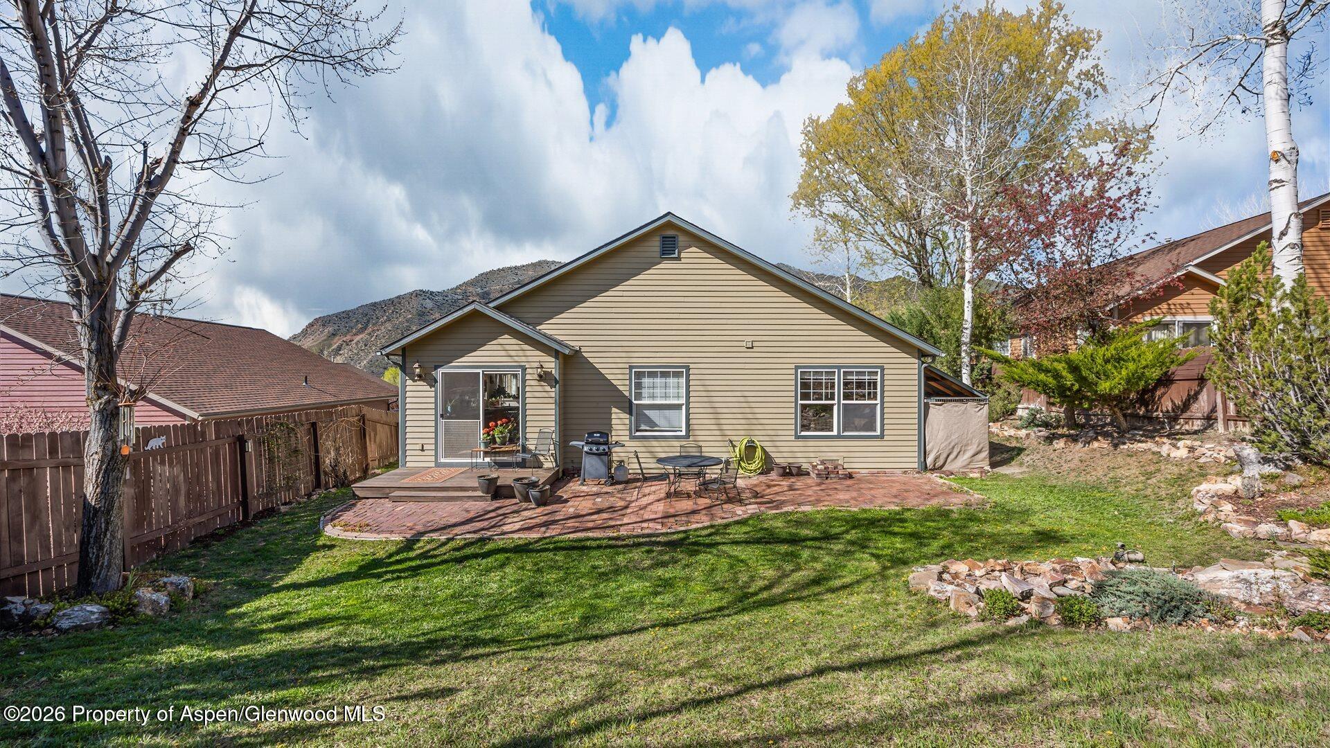 606 Lariat Loop New Castle, CO 81647 - Photo 23 of 27 a front view of house with yard and green space