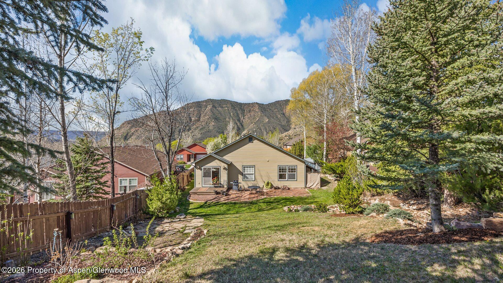 606 Lariat Loop New Castle, CO 81647 - Photo 24 of 27 a view of a house with a yard