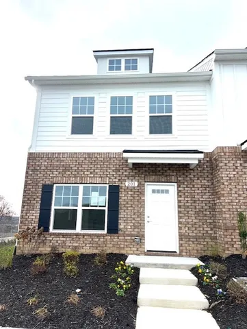 a bathroom with a shower and a sink
