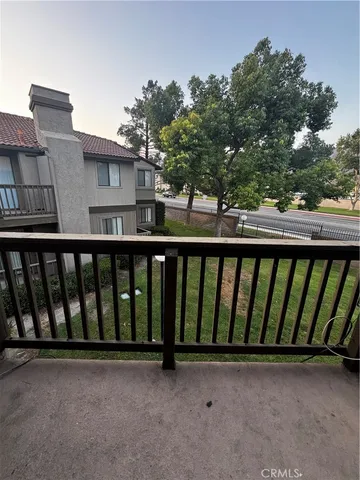 a balcony view with an outdoor space