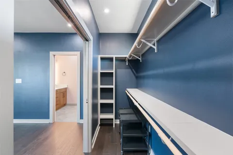 a view of an empty walk in closet