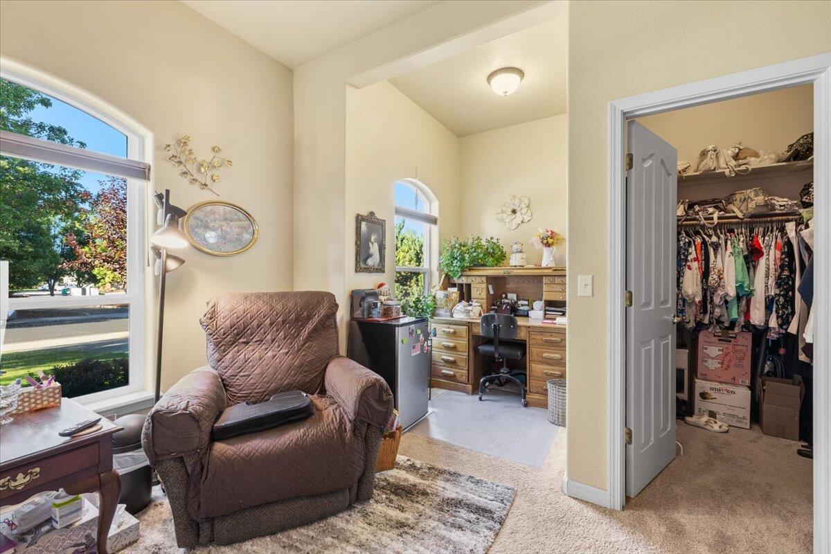 1105 Pumpkin Ridge Eagle Point, OR 97524 - Photo 19 of 40 a living room with furniture and a window