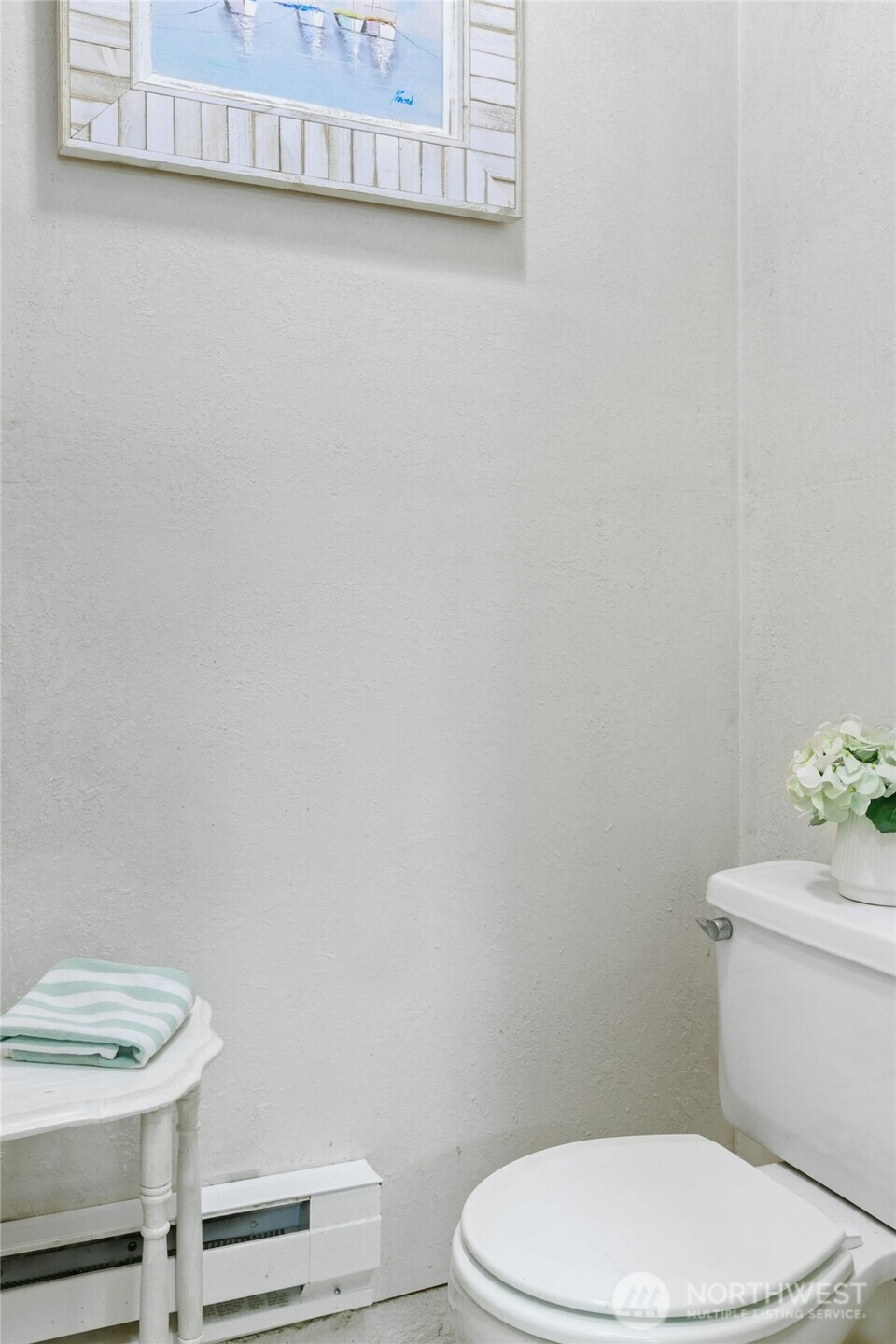 14938 Channel Lane La Conner, WA 98257 - Photo 29 of 40 a white toilet sitting next to a white wall