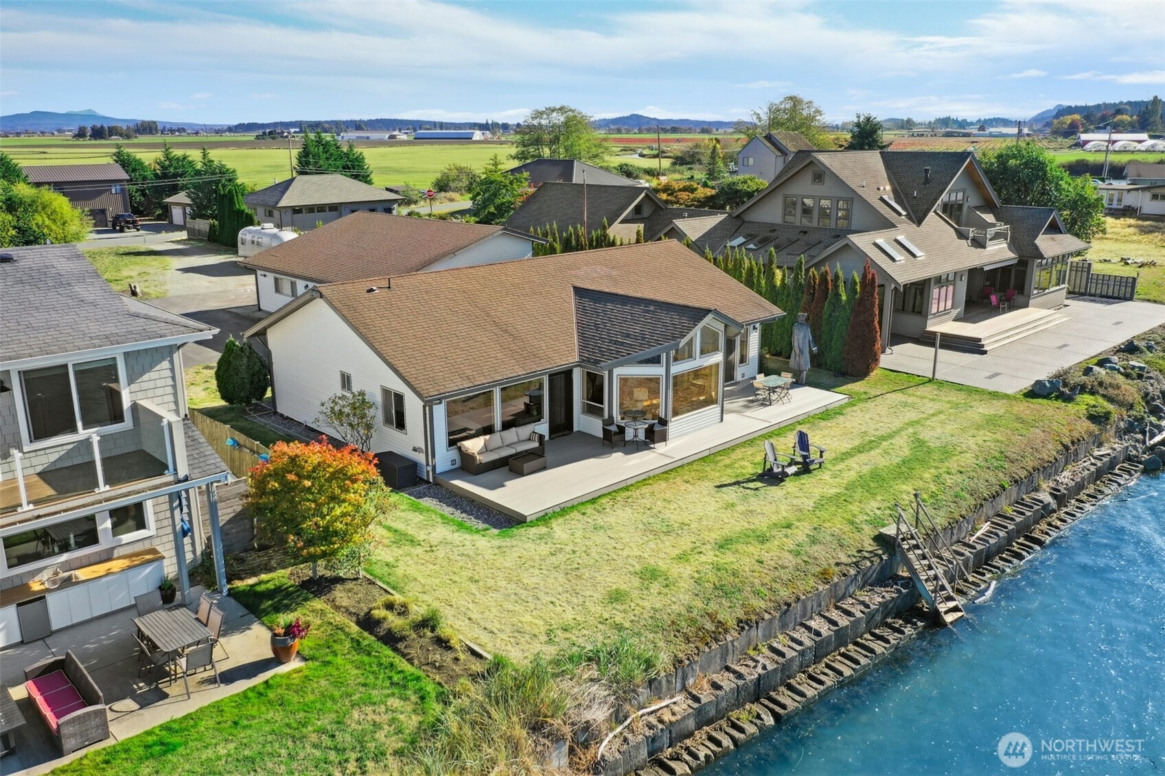 14938 Channel Lane La Conner, WA 98257 - Photo 39 of 40 an aerial view of a house with a garden and lake view