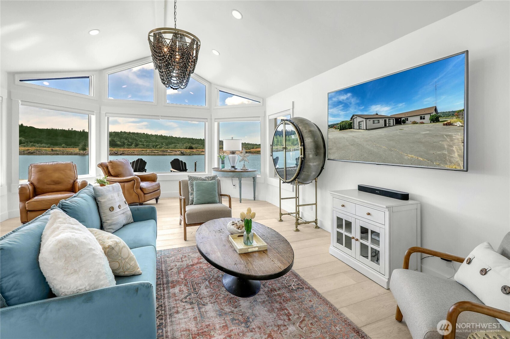 14938 Channel Lane La Conner, WA 98257 - Photo 8 of 40 a living room with furniture a rug and a large window
