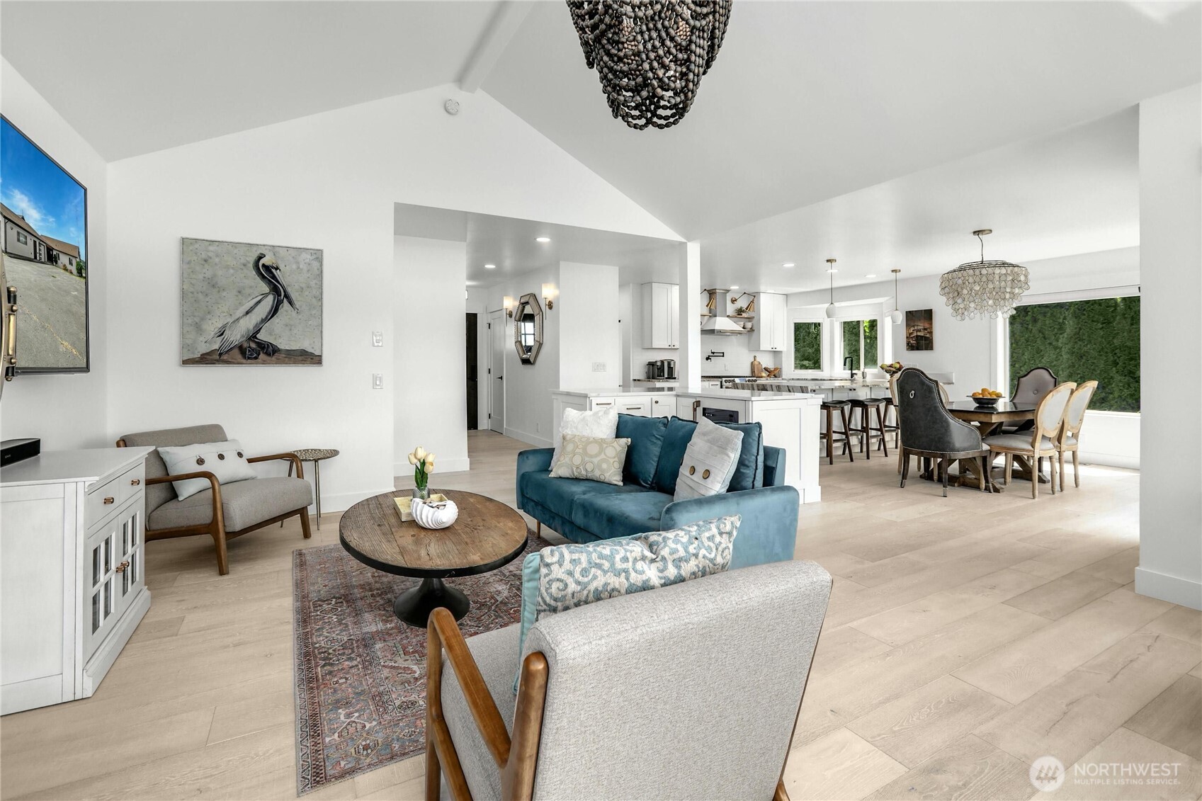 14938 Channel Lane La Conner, WA 98257 - Photo 9 of 40 a living room with furniture and a wooden floor