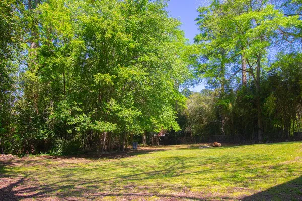 a view of a swimming pool with an outdoor space and seating area