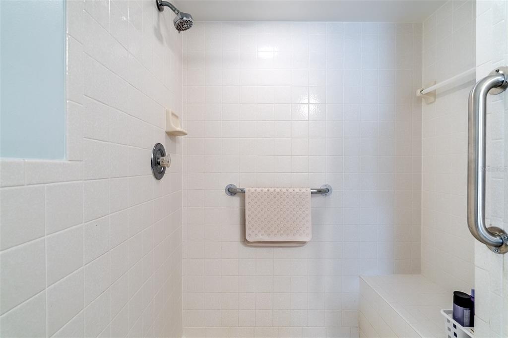 2296 Monaco Lane, Unit 8 Clearwater, FL 33763 - Photo 16 of 28 a bathroom with a shower
