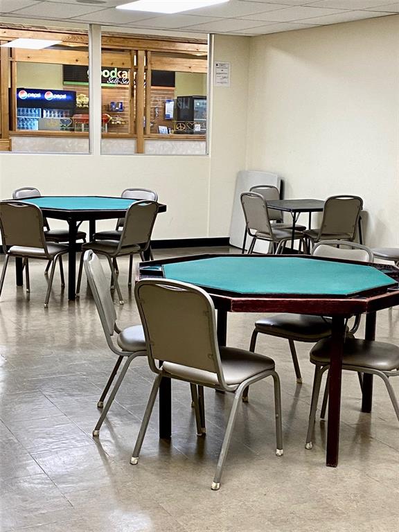 2296 Monaco Lane, Unit 8 Clearwater, FL 33763 - Photo 20 of 28 a view of a dining room with furniture and window