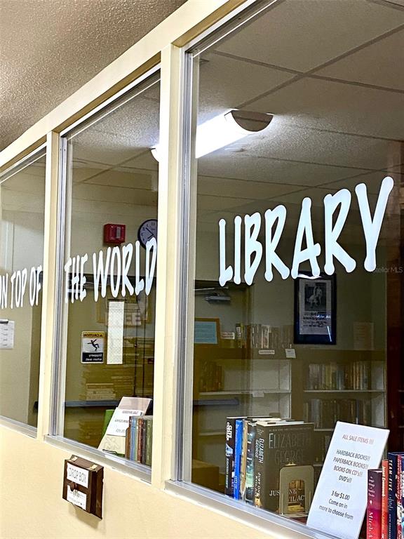 2296 Monaco Lane, Unit 8 Clearwater, FL 33763 - Photo 24 of 28 a view of a shop with a street