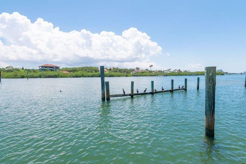 2296 Monaco Lane, Unit 8 Clearwater, FL 33763 - Photo 26 of 28 a view of swimming pool with seating