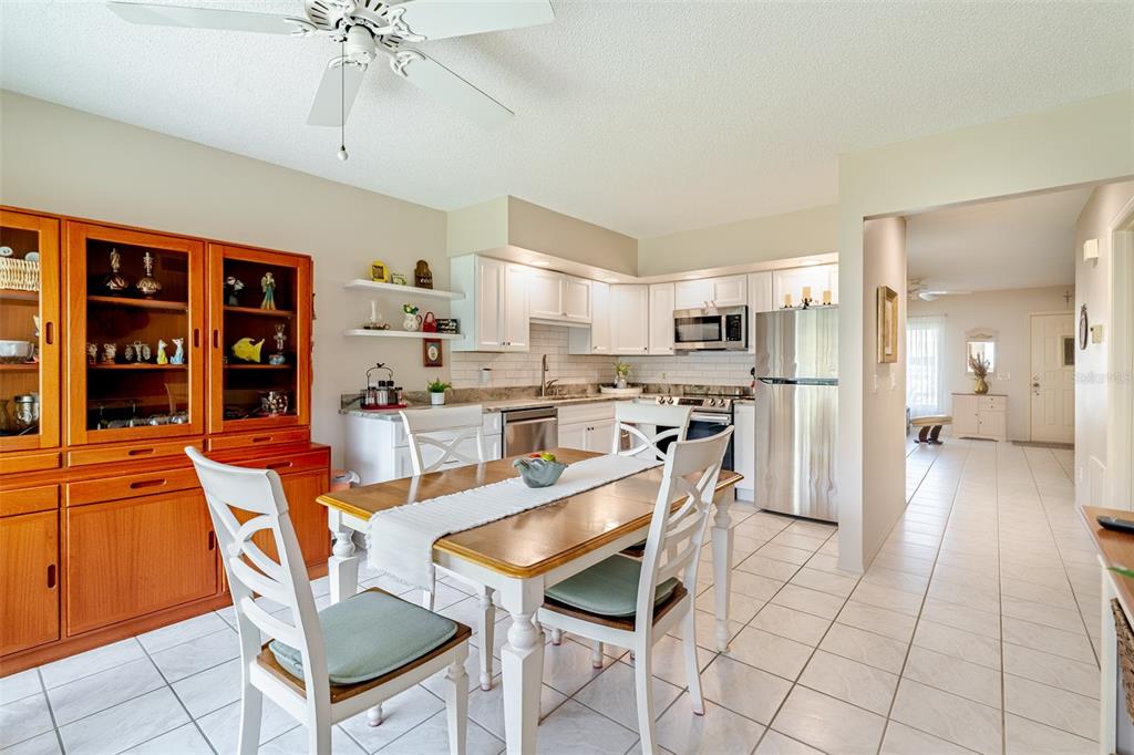 2296 Monaco Lane, Unit 8 Clearwater, FL 33763 - Photo 6 of 28 a view of a dining room kitchen and a window