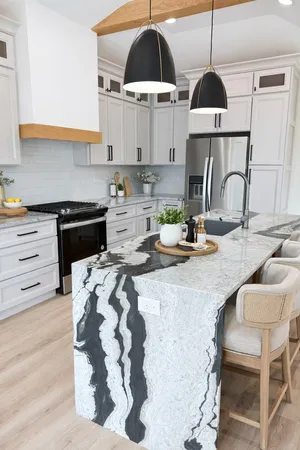 a kitchen with a sink a stove and cabinets