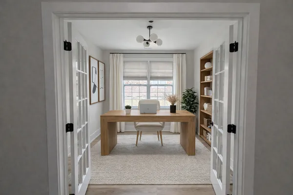 a work room with table and windows