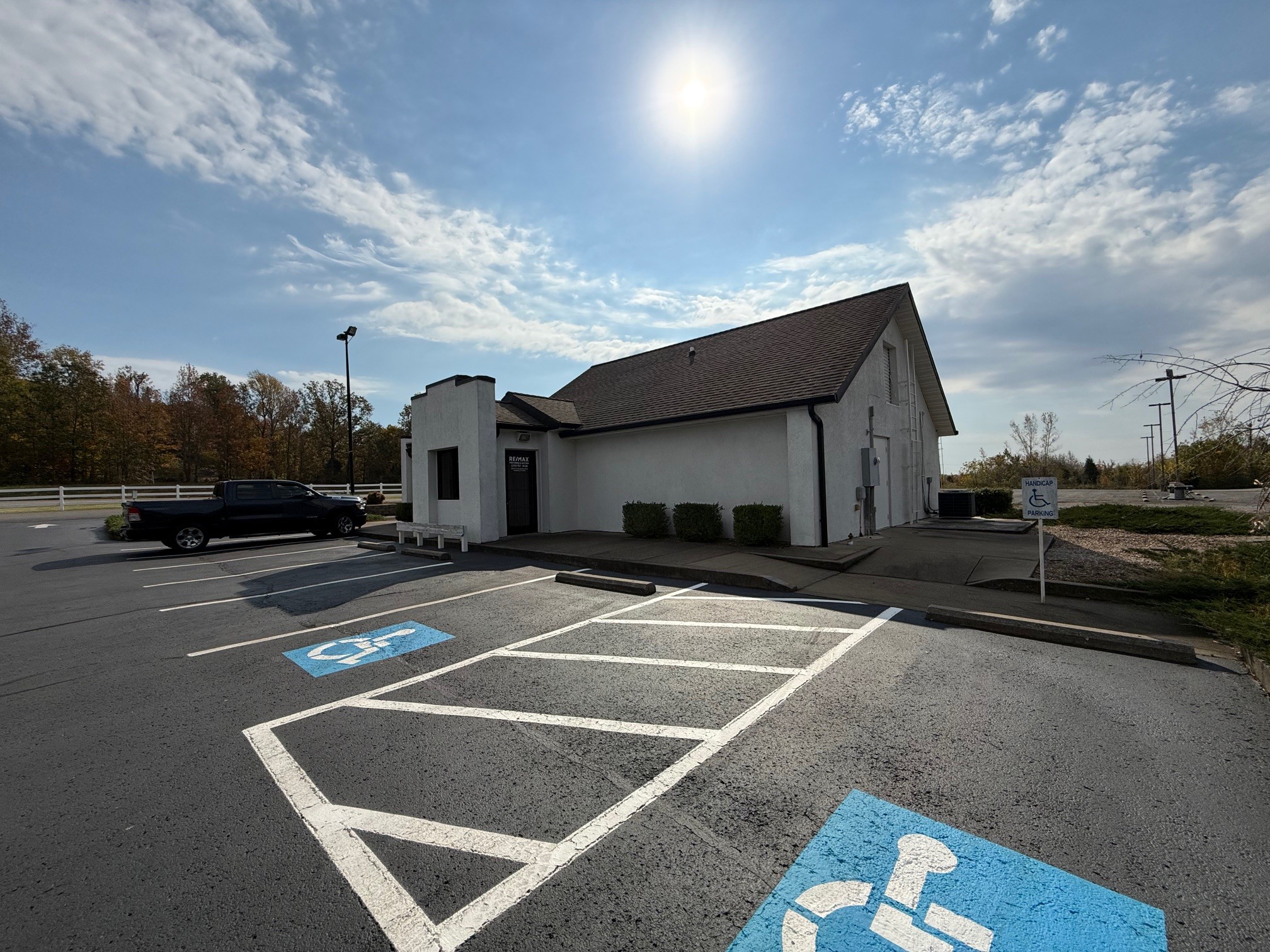 2007 West Everly Brothers Boulevard Powderly, KY 42367 - Photo 4 of 22 a view of a street with cars on road