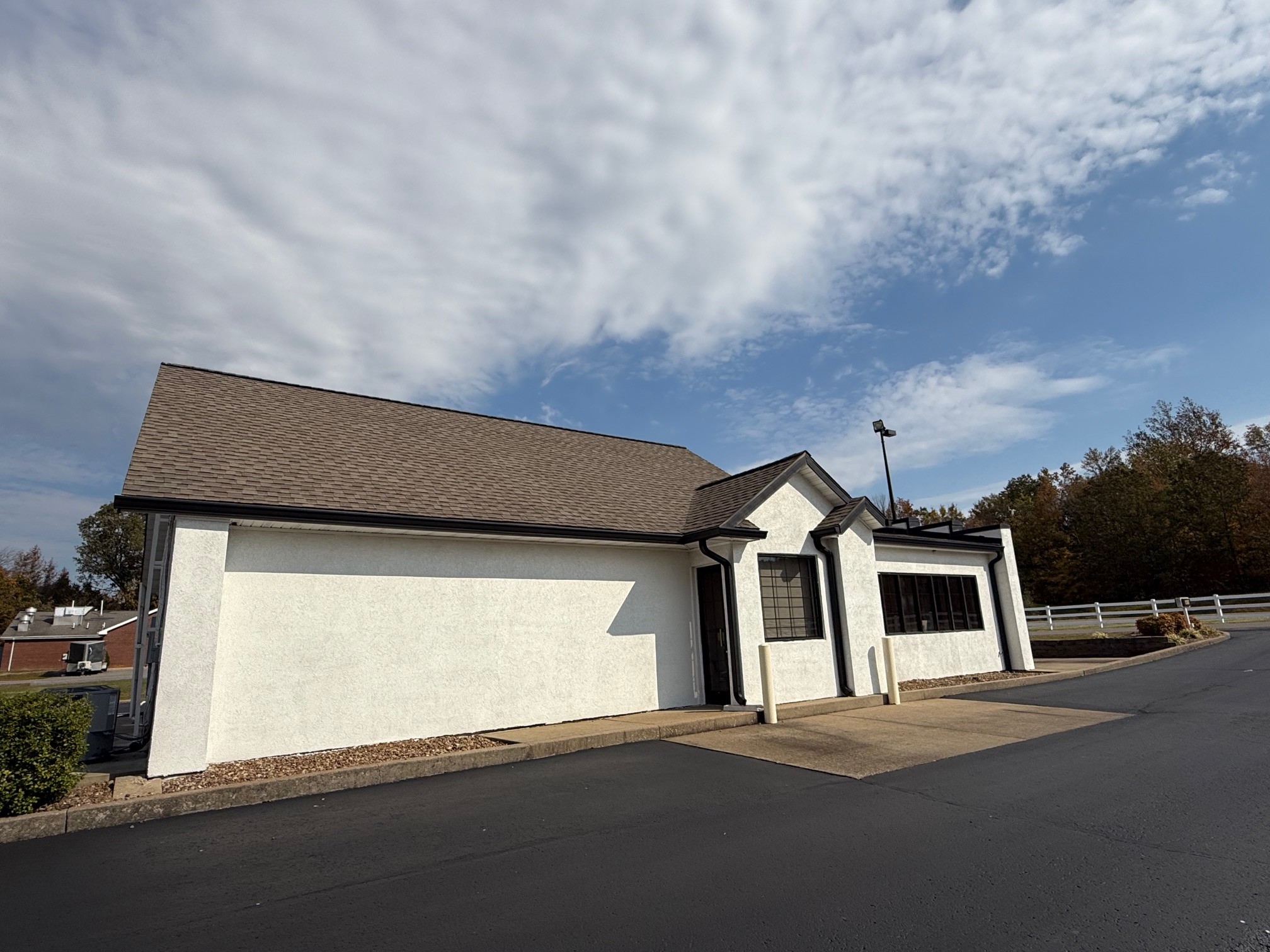 2007 West Everly Brothers Boulevard Powderly, KY 42367 - Photo 7 of 22 a house view with a garden space