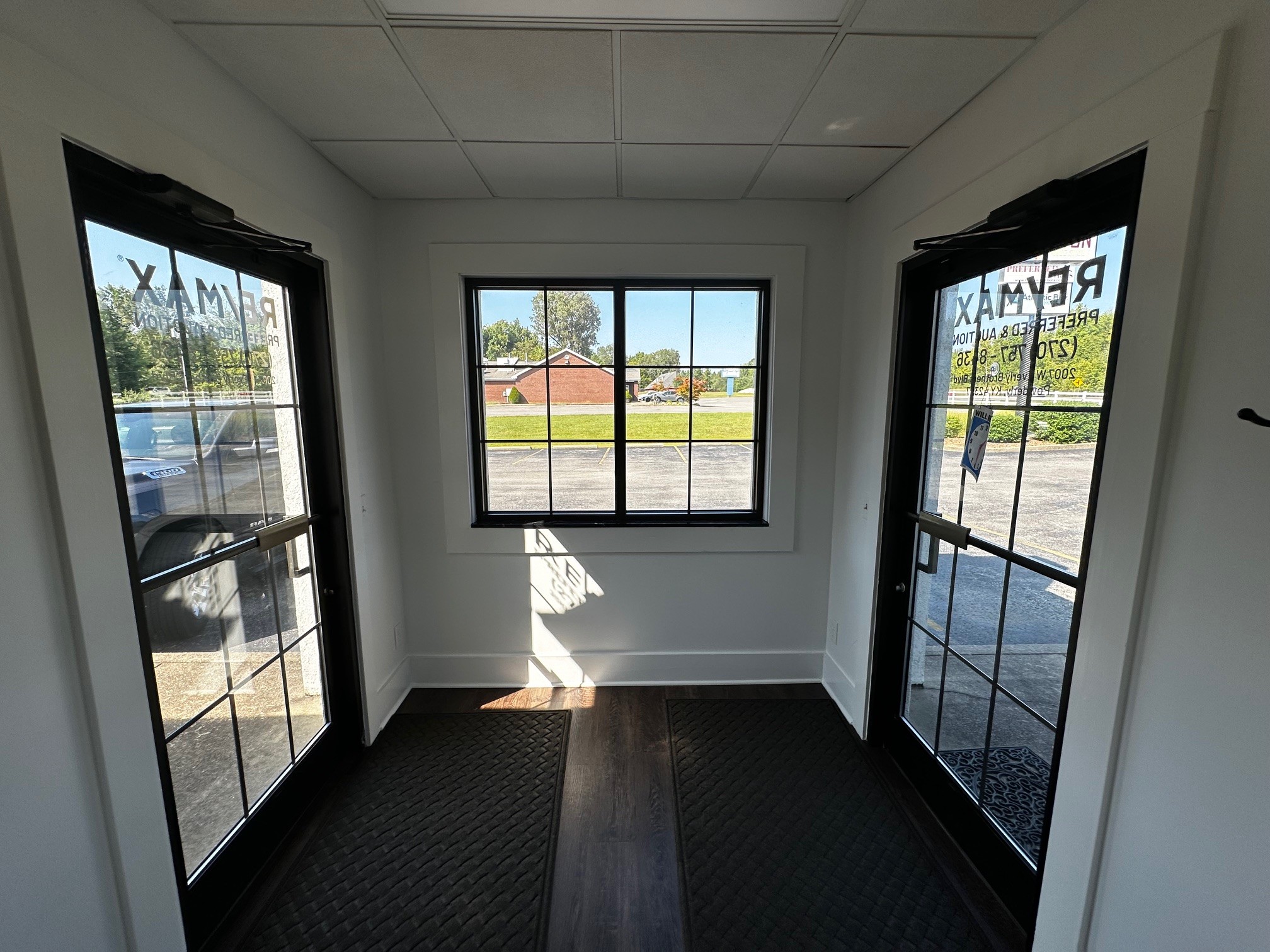 2007 West Everly Brothers Boulevard Powderly, KY 42367 - Photo 8 of 22 a view of empty room with wooden floor and fan