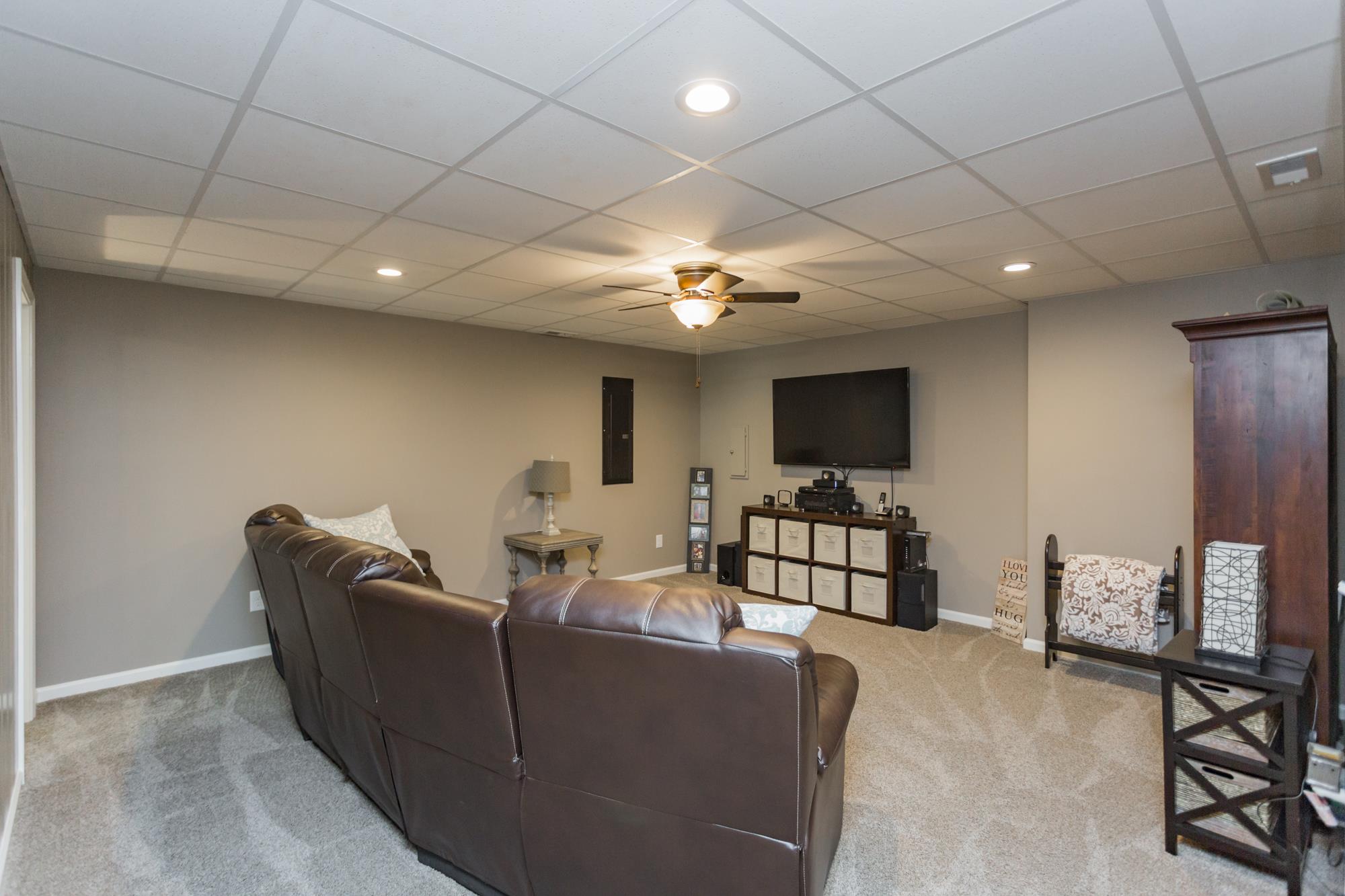 1354 Campbell Ridge Road Kingston Springs, TN 37082 - Photo 14 of 26 a living room with furniture and a flat screen tv