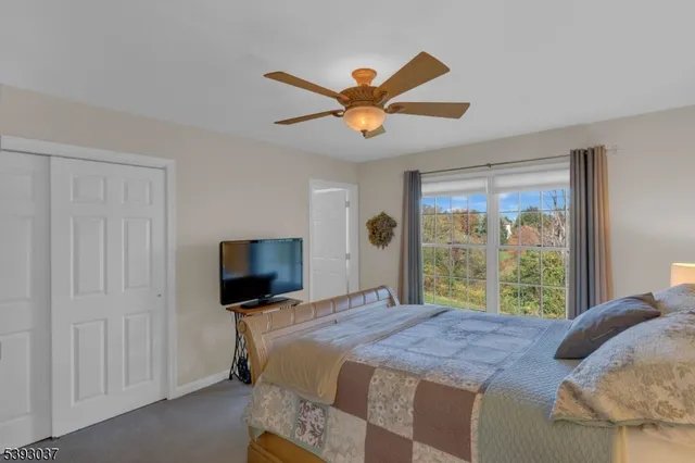 a view of living room with furniture and a window