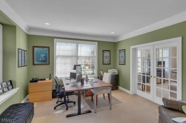 a view of a livingroom with furniture and a window