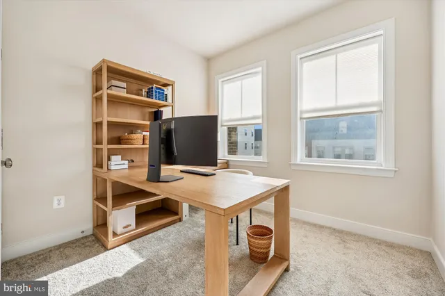 a room with furniture and a window