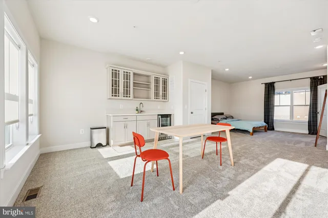 a view of a dining room with furniture window and outside view
