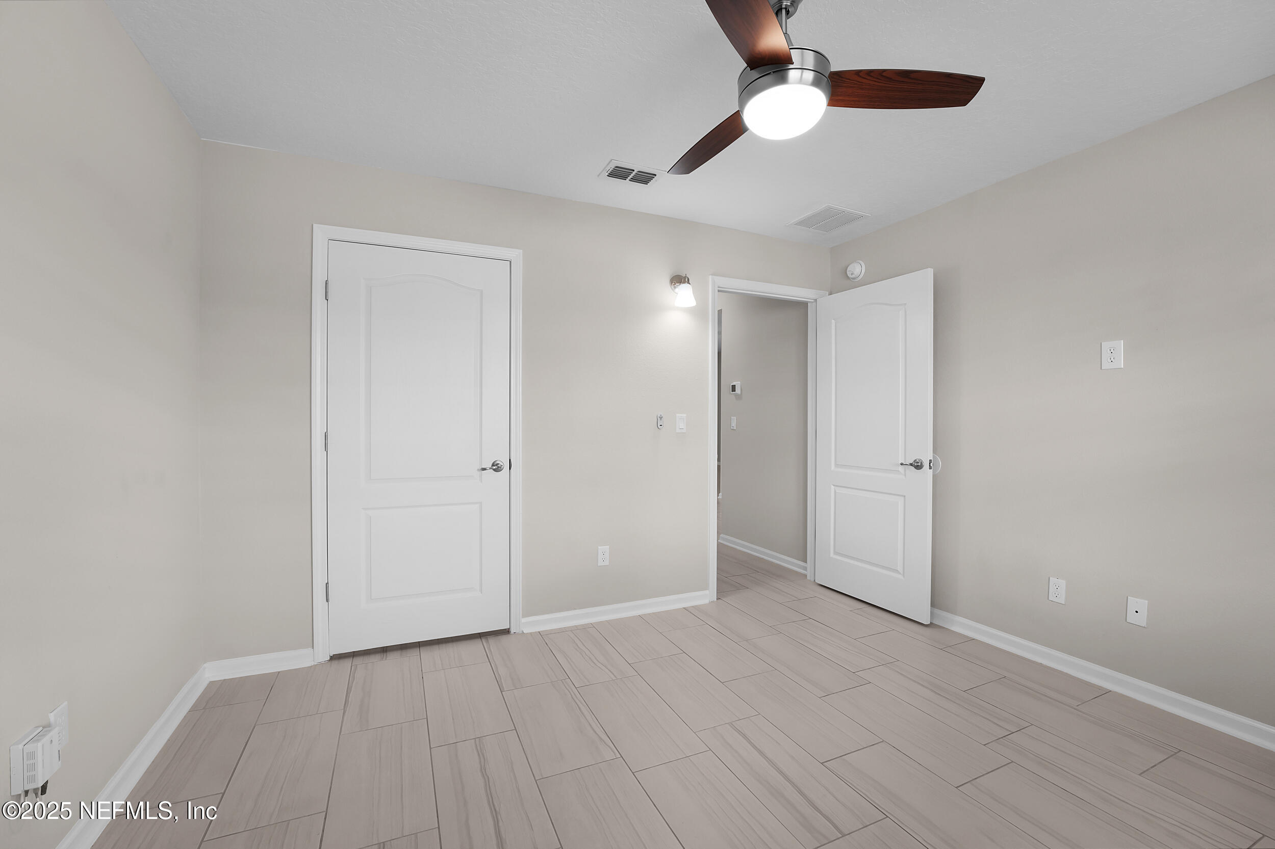 516 Lumpkin Street Jacksonville, FL 32222 - Photo 20 of 45 wooden floor in an empty room