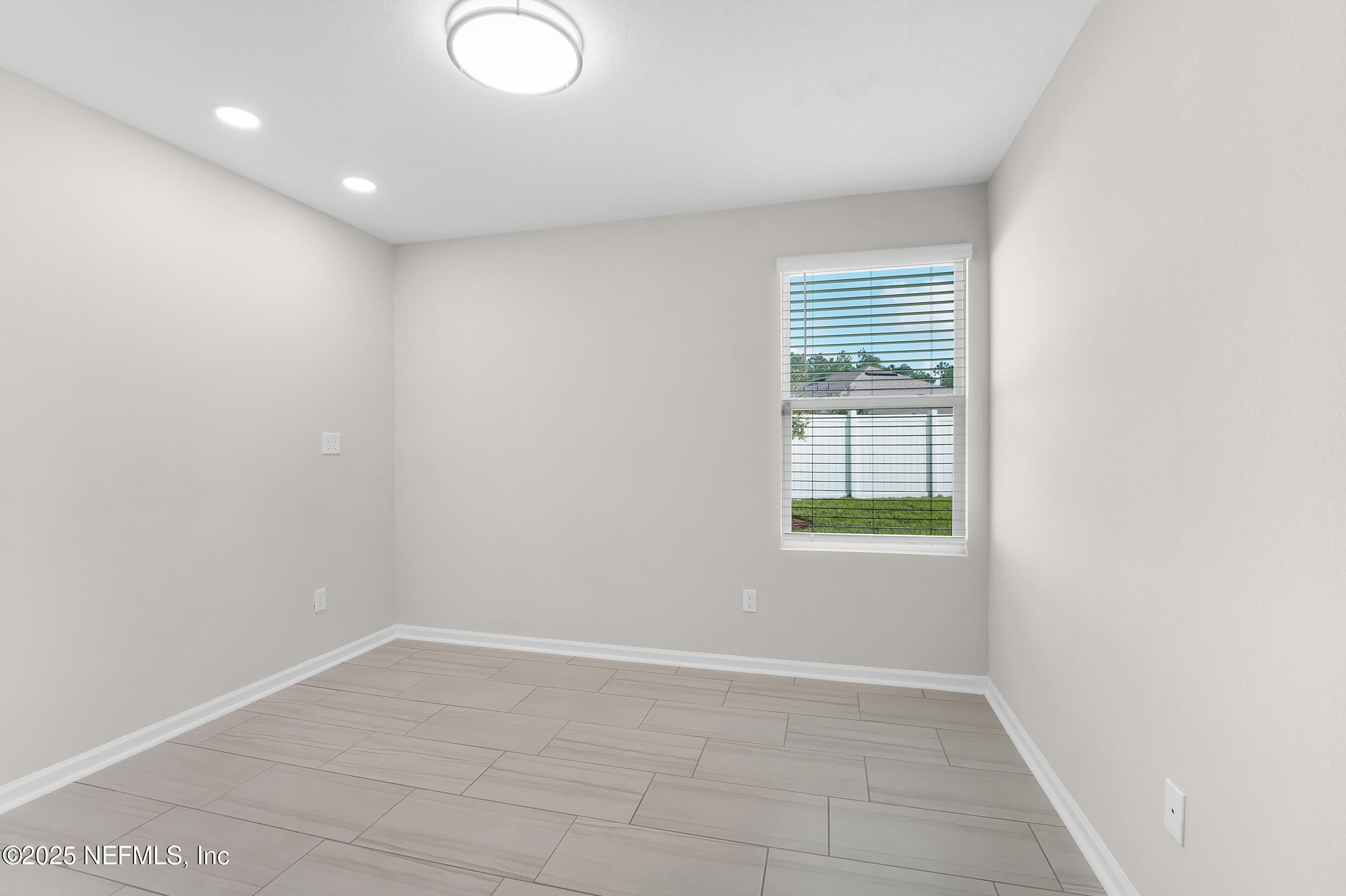 516 Lumpkin Street Jacksonville, FL 32222 - Photo 23 of 45 an empty room with a window