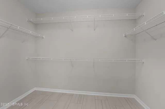 a view of a room with racks on the wall