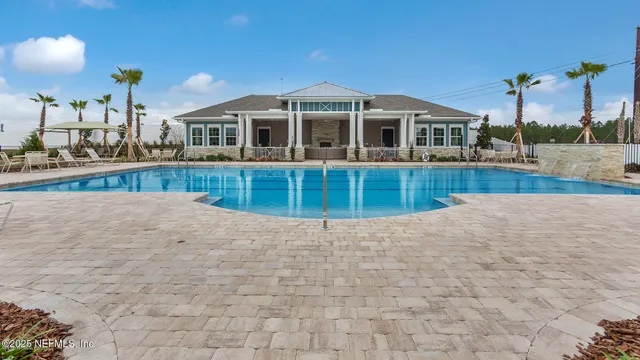 a view of a house with a swimming pool