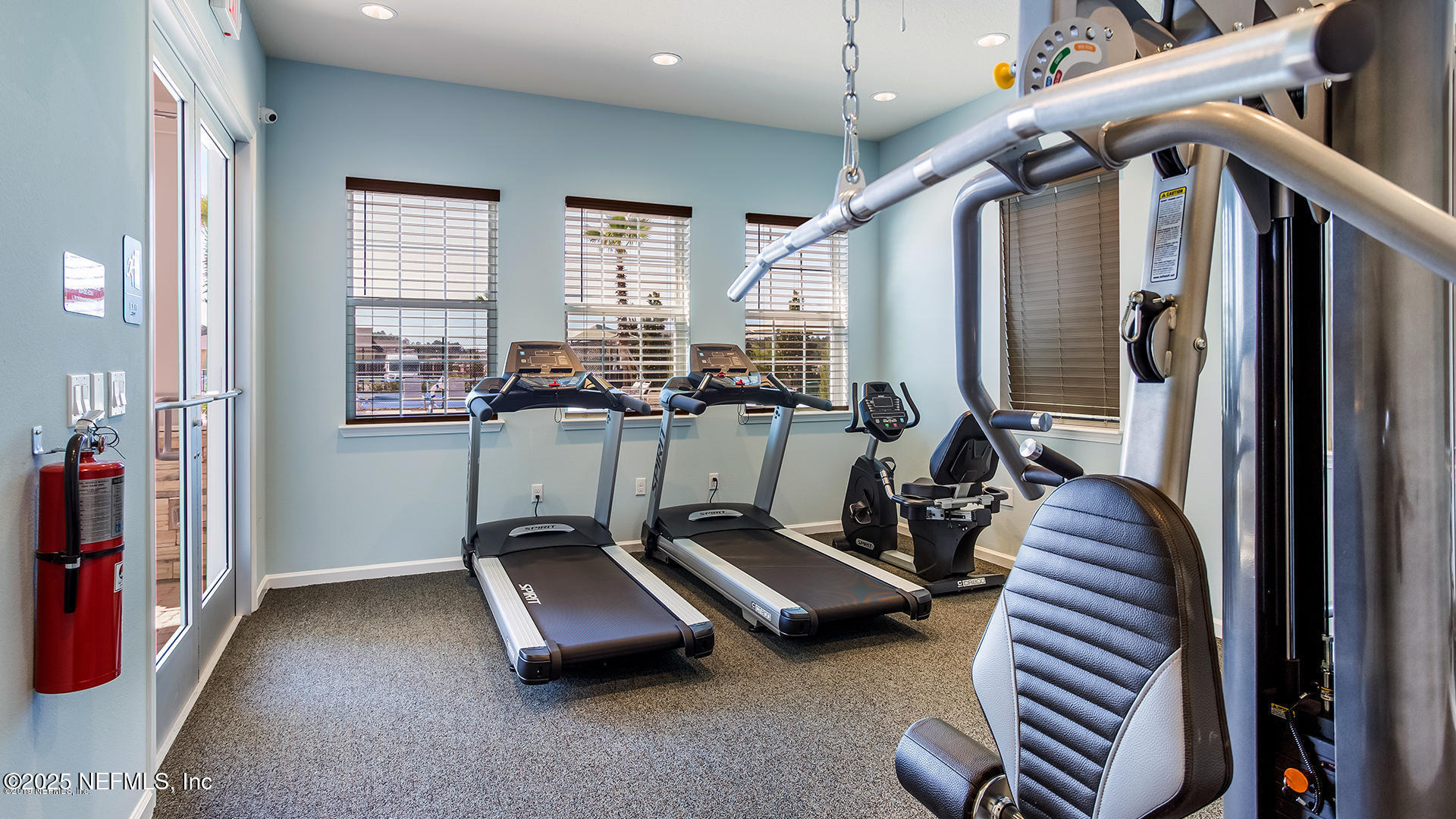 516 Lumpkin Street Jacksonville, FL 32222 - Photo 37 of 45 a room with gym equipment and a large window
